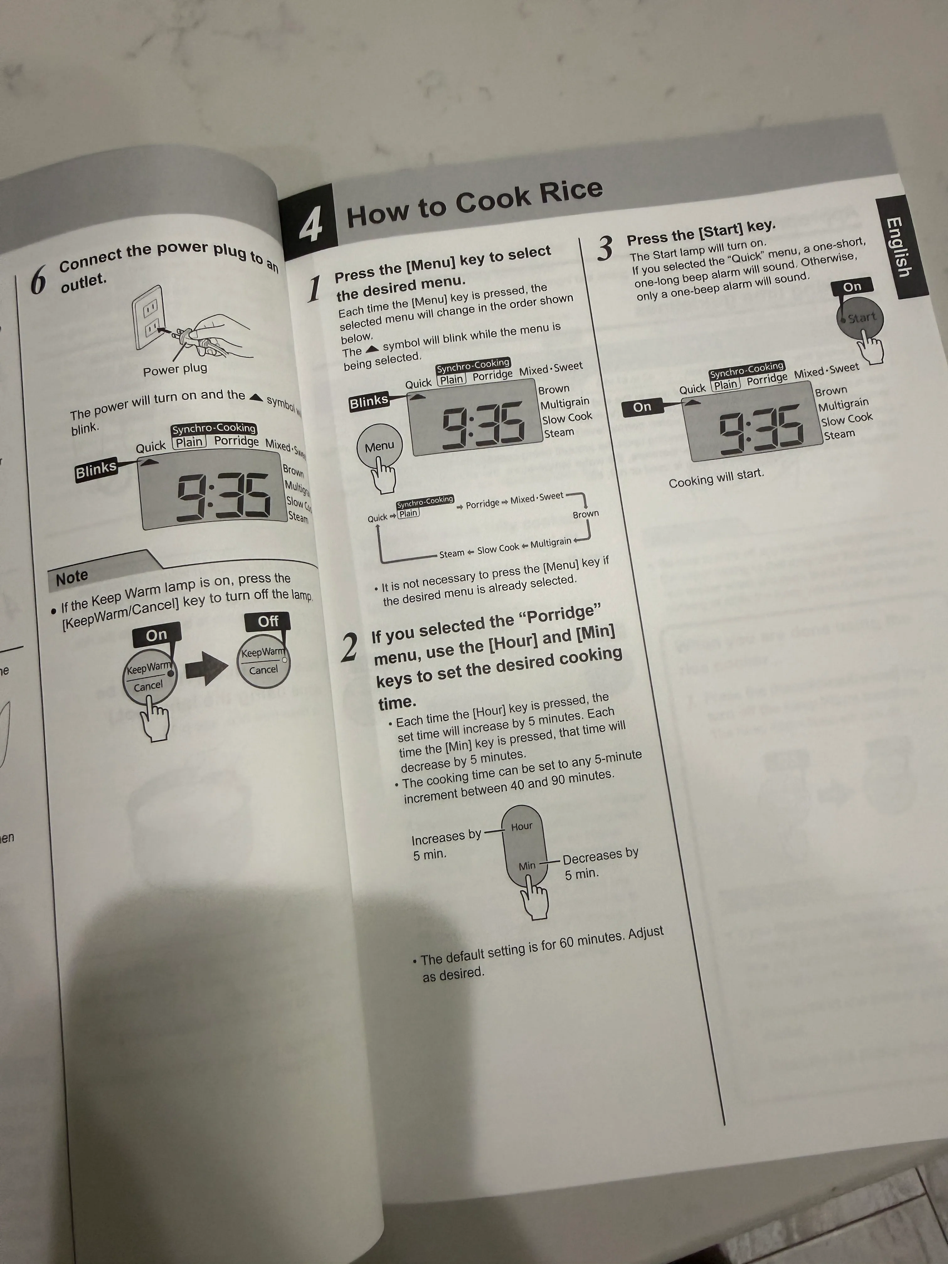 The instruction manual showing a clock reading 9:35